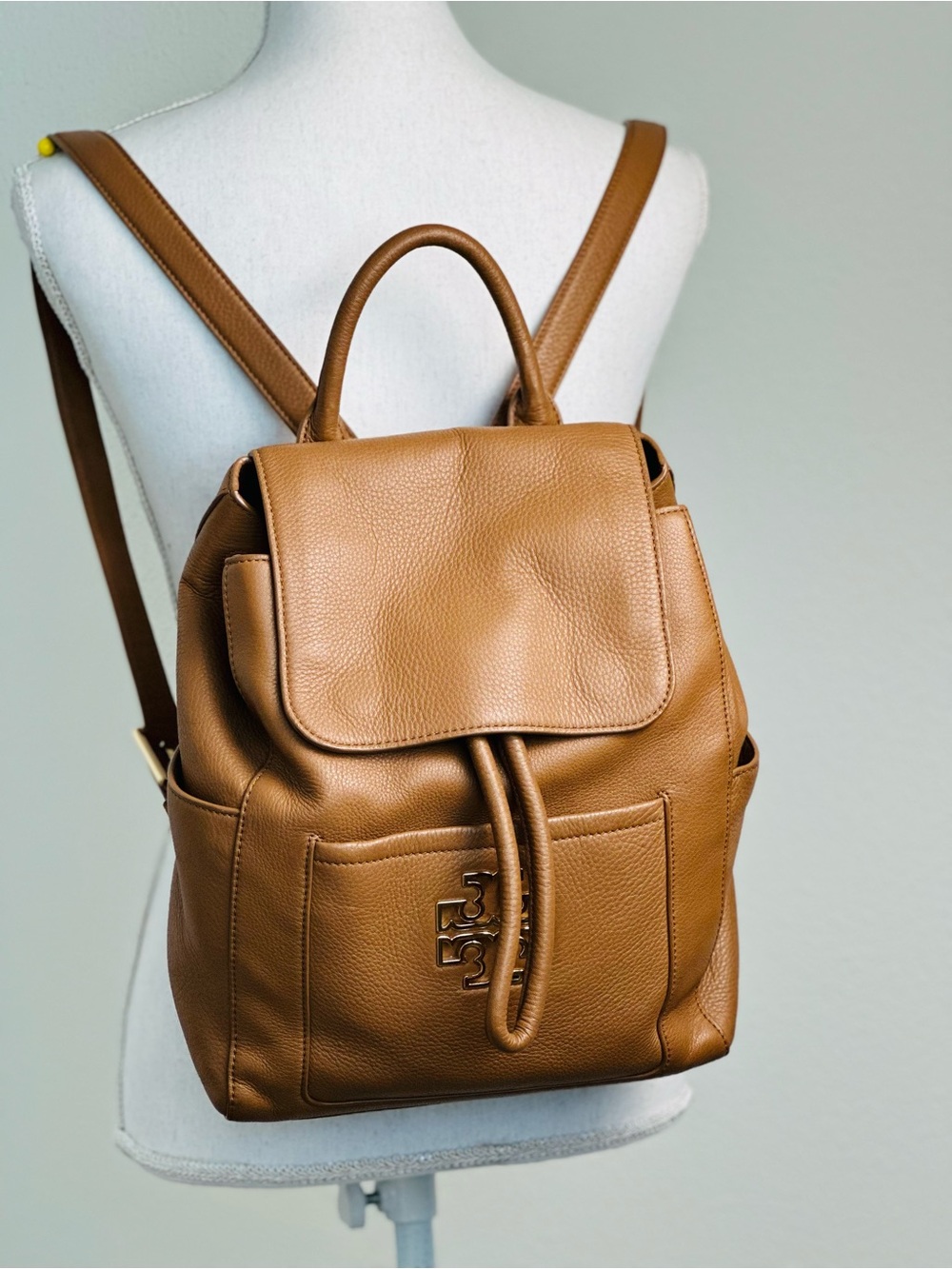 Tory Burch Tan Pebbled Leather Backpack Magnetic Flap Closure and Drawstring
